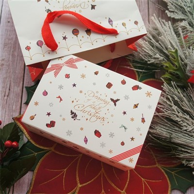 Ippakkjar tal-kaxxa tar-rigali tal-Milied